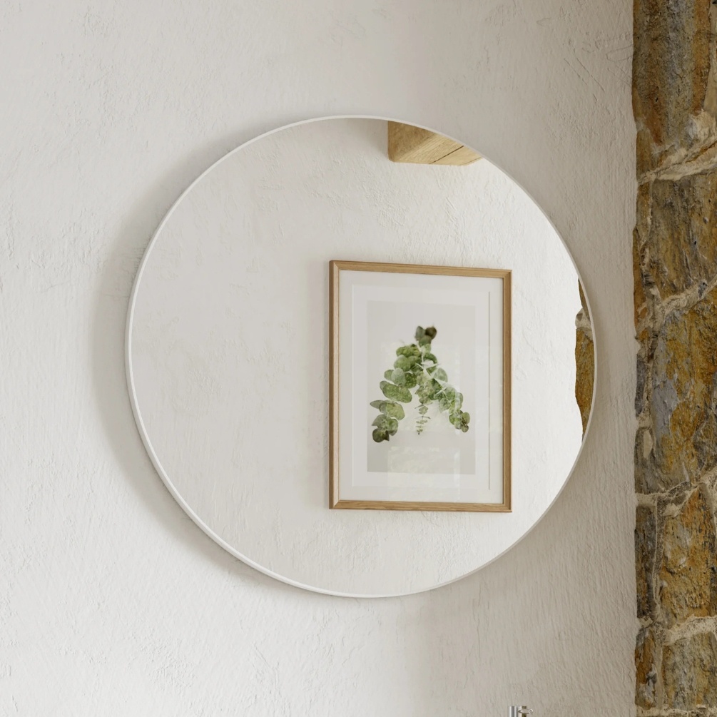 Lifestyle image of the hib. Trim Round 600mm Matt White Bathroom Mirror